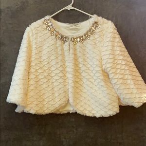 white, fuzzy cardigan